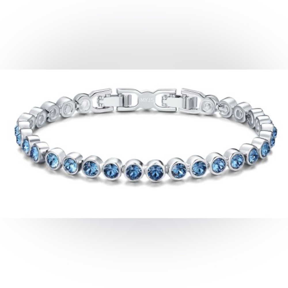 Mini ice bracelet rhodium plated with Denim blue Swarovski crystals and extender